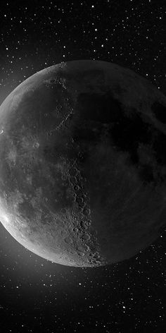 an image of the moon taken in black and white with stars around it, as seen from space