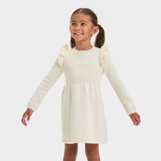 Dress up your toddler in cute style with this Solid Crewneck Dress from Cat & Jack™. Made of cotton and acrylic, this dress features a crew neckline for a timeless look. Tailored in a knee length, the dress has long sleeves with ribbed cuffs for a snug fit. Plus, the pullover style provides ease of wear. Cat & Jack™: Designed for all children so you can trust it's made for yours. Toddler Sweater Dress, Sweater Dress Outfit, Cozy Dress, Toddler Sweater, Ribbed Sweater Dress, Solid Color Dress, Long Sleeve Print Dress, Crewneck Dress, Cute Style