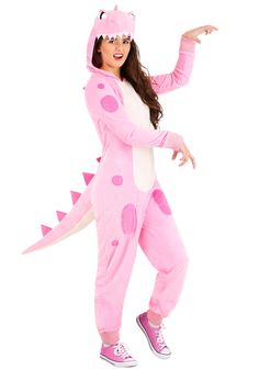 a woman dressed in a pink dinosaur costume