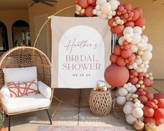 an outdoor bridal shower is decorated with balloons