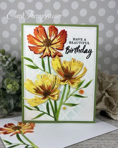 a birthday card with flowers on it