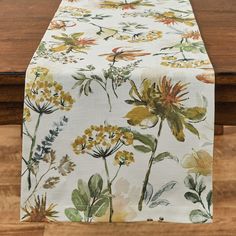 an image of a table runner with flowers on it