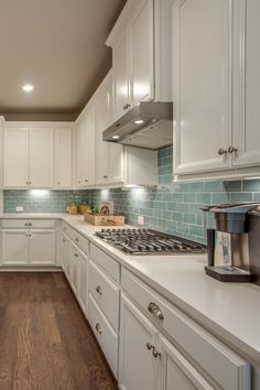 the kitchen is clean and ready for us to use it's new counter tops