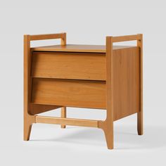 a wooden desk with two drawers on one side and an open drawer on the other