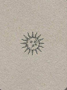 a drawing of a sun with a face drawn on it