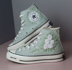 "Experience the art of hand embroidery on Converse embroidered shoes, a testament to meticulous craftsmanship." Embroidered Converse custom wedding flower/ Converse high tops chuck taylor Embroidered flower/ Personalized name and date/ brithday gift  💸 Price includes Converse Shoes and floral embroidery as shown 🌸 You can send me your Converse/Vans shoes or I can buy them for you. We stock all the Converse and Vans shoes you want, if you want other Converse/Vans shoes in the store, please mess Embroidery On Converse, Embroidered Converse High Tops, Flower Converse, Cute Converse Shoes, Bridal Sneakers, Embroidered Converse, Cute Converse, Converse Custom, Pretty Sneakers