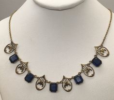 "Beautiful antique victorian Art Deco gold filled with royal blue sapphire necklace cute and dainty good pre-owned condition measures 16\" length." Blue Medieval Necklace, Antique Sapphire Necklace, Sapphire Necklace Vintage, Medieval Necklace, Blue Stones Jewelry, Victorian Art Deco, Art Deco Gold, Blue Sapphire Necklace, Amethyst Studs