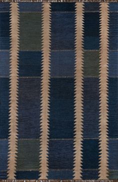 an area rug with different colors and patterns