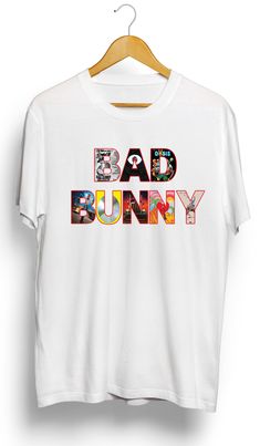 This Bad Bunny Albums T-Shirt / Hoodie features the top-selling albums of the Latin trap and reggaeton superstar, showcasing his unique style and music. Made with high-quality materials, this shirt is a must-have for any fan of Bad Bunny. Show your love for his music and stand out in style with this exclusive t-shirt. Features • 5.3 oz., 100% preshrunk cotton • Double-needle sleeve and bottom hems •Taped neck and shoulders•Classic midweight fabric•Classic fit tubular body •7/8" collar•Classic fi Bad Bunny Senior Shirt, Bad Bunny Tshirt, Bad Bunny Disney Shirt, Bad Bunny Vintage Tshirt, Bad Bunny Long Sleeve Shirt, Bad Bunny Kids Shirt, Bebesota Bad Bunny Shirt, Bad Bunny, Style Hoodie