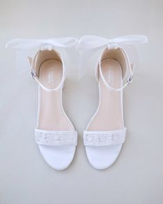 White Sandals For Bridesmaid In Spring, White Sandals For Spring Bridesmaid, Open Toe Bridesmaid Wedding Shoes With Bow, Bridesmaid Open Toe Wedding Shoes With Bow, Feminine Low Heel Sandals For Weddings, Feminine Closed Toe Wedding Sandals, Summer Bridal Shower Sandals With Block Heel, Spring Party Sandals With Lace, Spring Party Lace Sandals