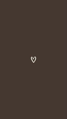 a white heart on a brown background