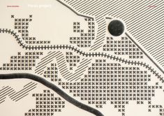 a black and white photo of a map with dots on it's surface,