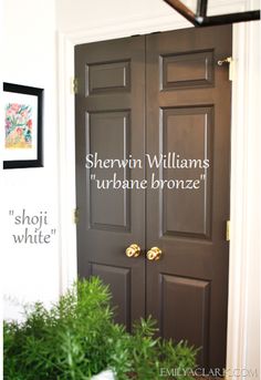 there is a brown door with the words shewn williams and urbane bronze on it