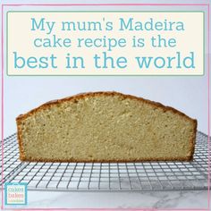 a loaf of bread on a cooling rack with the words my mum's maddera cake recipe is the best in the world