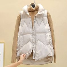 Ingvn Autumn Winter Down Cotton Soild Women's Vest Short Style 2021 Ne Winter Cotton Sleeveless Vest, Sleeveless Fall Outerwear For Outdoor, Cold Weather Sleeveless Vest Outerwear, Winter Cotton Vest Outerwear, Khaki Winter Vest With Pockets, Beige Vest For Winter Cold Weather, Beige Winter Vest For Cold Weather, Beige Vest For Cold Weather And Winter, Beige Vest For Cold Weather In Winter