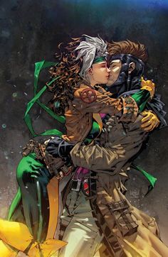 an image of a man and woman kissing in front of the x - men logo