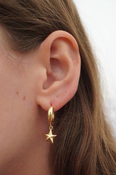 The cutest star earrings! ~18k Gold Plated Hypoallergenic Huggie Earrings Trendy Gold Earrings With Star Charm, Tarnish Resistant Star Earrings, Nickel-free Star-shaped Huggie Earrings, Everyday Star-shaped Tarnish Resistant Earrings, Tarnish Resistant Star-shaped Everyday Earrings, Everyday Star-shaped Tarnish-resistant Earrings, Cute Gold Huggie Earrings, Star-shaped Huggie Earrings As A Gift, Cute Stars