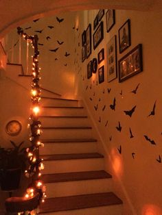 the stairs are decorated with halloween decorations and lights