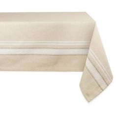 a table cloth with white stripes on the edges and a beige stripe down the middle