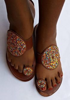 Made using quality leather and fine beads. Very comfortable walking around.You pay shipping for one item even after purchase more than one item.All orders shipped via DHL Express.https://www.etsy.com/shop/RozzyAfricanShop?ref=seller-platform-mcnav Fancy Sandals, Beautiful Sandals, Womens Sandals Summer