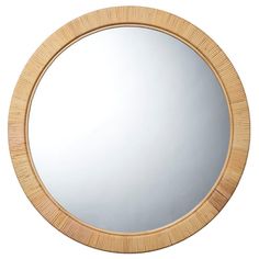 a round mirror that is made out of wood