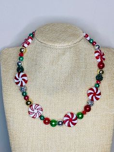 The necklace shown is 20 inches long Pick length below  All beads are acrylic  Beads range from 12mm - 20mm Reused Jewelry, Christmas Bead Necklace, Christmas Peppermint, Candy Necklace, Children's Jewelry, Candy Necklaces, Christmas Necklace, Christmas Pendant, Basic Jewelry