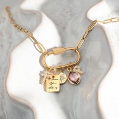 This elegant and adjustable Gold Charm Necklace is the perfect personalized gift for women. The sleek and trendy design allows for easy customization by adding various charms of your choice, making it a unique piece of jewelry that fits any style. Whether you want to celebrate a special moment with a zodiac charm or create a DIY design for a loved one, this necklace offers endless possibilities. Crafted with a high-quality gold-plated chain, it's an excellent choice for birthdays, holidays, and Custom Engraved Necklace, Personalized Charm Necklace, Custom Charm Necklaces, Lock Necklace, Mixed Metal Jewelry, Custom Charms, Zodiac Gifts, Best Gifts For Her, Gold Charm Necklace