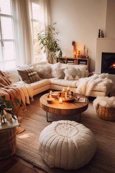 a living room filled with furniture and candles