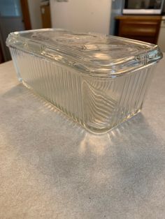 a glass dish sitting on top of a counter