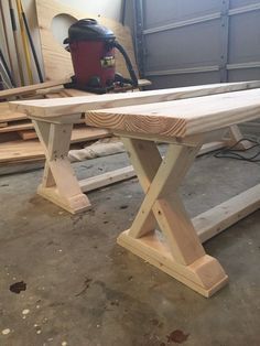 a wooden bench being built in a garage