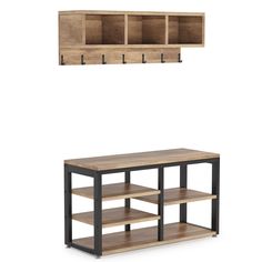 a wooden shelf with two open shelves and one closed shelf on the wall above it