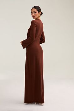 Step into elegance with our Aissia Ribbed Twist Front Maxi Dress. The ribbed fabric and twist front create an elegant design that can be dressed up or down. Perfectly versatile, this dress pairs beautifully with an abaya for a luxurious and sophisticated look. Model is 5'7 wearing size S/58" Dresses Flowy, White Dress Formal, Nikkah Dress, Dress Satin, Engagement Dresses, Kids Outerwear, Ribbed Dresses, Basic Dress, Twist Front