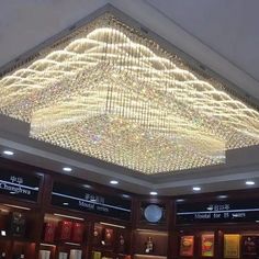 a chandelier hanging from the ceiling in a store