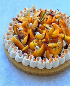 there is a cake that has peaches on it