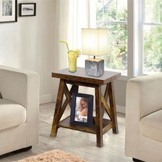 a living room scene with focus on the end table and chair, which has a photo frame sitting on it