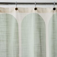 a curtain with circles on it in front of a window