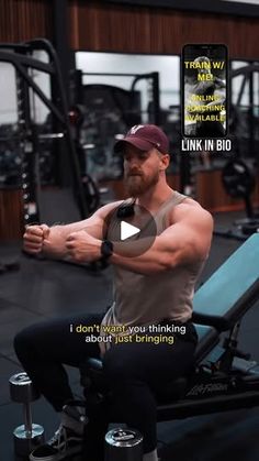 a man is squatting on a bench in the gym