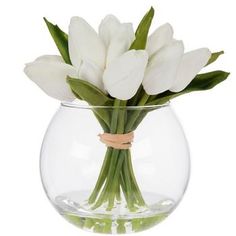 a clear vase with white flowers in it