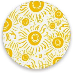 an orange and white plate with yellow designs on it