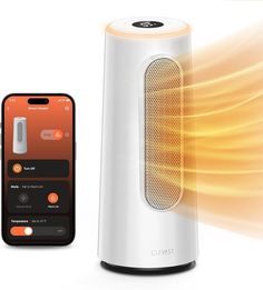 an orange and white speaker next to a cell phone