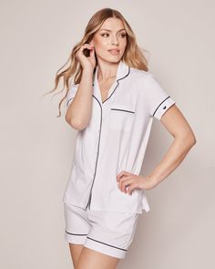 Premium 100% cotton twill makes this design crisp, comforting, and cozy. The moisture-wicking weave is yarn-dyed to help prevent fading, and brushed for added softness. Cotton twill becomes more buttery with every wash. Curl up in luxury and slip off to dreamland. Bonne nuit. Classic Cotton Summer Sleepwear, Classic Cotton Sleepwear For Spring, White Classic Sleepwear For Spring, White Cotton Home Tops, Comfortable Cotton Tops For Daywear, White Relaxed Fit Tops For Home, Cotton Tops With Contrast Trim For Loungewear, Comfortable White Sleep Tops, White Cotton Tops With Contrast Stitching