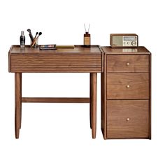 a wooden desk with two drawers and a radio on top