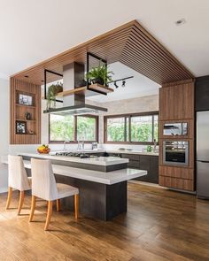 Plus, they prove once and for all that streamlined style can be warm and inviting. Hiasan Dalaman Dapur, Dapur Moden, Small Kitchens, Kitchen Design Plans, House Design Kitchen, Interior Modern