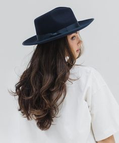 Our Monroe Rancher felt fedora hat is a bestseller for good reason, this quintessential wool fedora hat stands the test of time making it the perfect staple in any wardrobe. The Monroe Rancher is a hat with a teardrop shaped crown, stiff upturned brim, and is paired with a tonal grosgrain band. These beautiful combinations make this felt fedora hat a classic. Wool Fedora Hat, Crown Heights, Wool Fedora, Felt Fedora, Hat Stands, Halo Style, Wearing A Hat, Find Color, Felt Hat