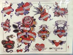 an assortment of tattoos on display in a glass case