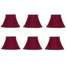 six red lampshades are lined up in a row