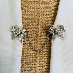 Sweater Clips Crystal Sweater Clip Round Crystals Chain Cardigan Clip Chained Rhinestone Gift for Mom Gifts for Her by Fabulici Only from Fabulici, made in the USA. There are clips on the back, with rubber ends, so you can easily close your sweater, cardigan or scarf. Gives your cardigan/sweater an exquisite look! Stunning!! Coloring will very slightly. Elegant unique gift with style. NO SEWING NEEDED. Couture, Chain Cardigan, Cardigan Clips, Crystals Wedding, Sweater Clips, Sweater Clip, Man Repeller, For Her Gifts, Crystal Chain