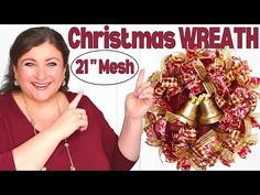 a woman pointing at a christmas wreath with the words 21 mesh on it and an image of a bell