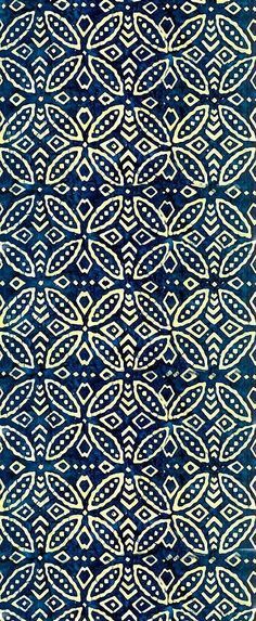 a blue and white background with an intricate design