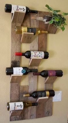 a wine rack made out of wooden pallets